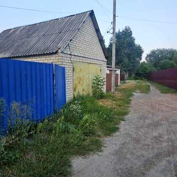 Будинок з гаражем в центрі Клавдієво-Тарасове