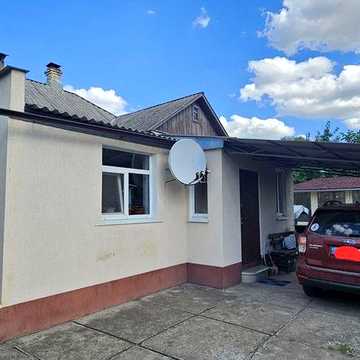 Продам добротный дом в Изюме с большим участком