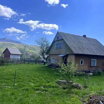 19 соток у гір у Синевирі + будинок, струмок та водоспад