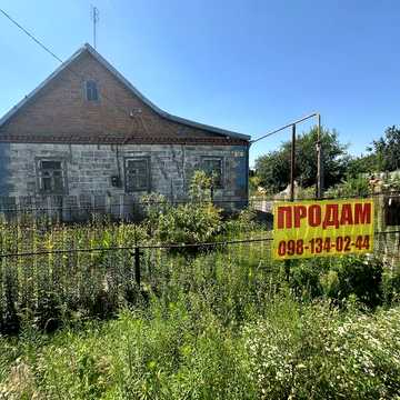 Продам дом в центре Новоалександровки