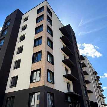 Велика 2-кімнатна квартира з кухнею-вітальнею та гардеробною — 55,6 м²!