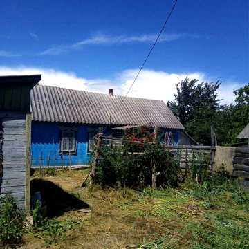 Земельна ділянка з хатиною
