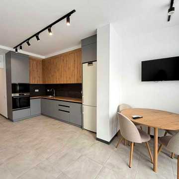 Оренда квартири в ЖК R2 Residence, вул. Роксоляни. Спальня та кухня-студіо