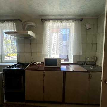 Р-н Зигіна  частина будинку з місцем для авто