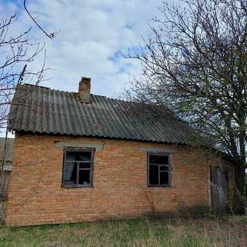 Будинок цегляний та підсобне приміщення