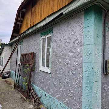 Продам 1/2 БУДИНКУ в р-ні 1 міської лікарні. 26000
