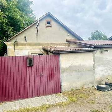 Дві двукімнатні квартири на землі з власним двориком на вул. Глиняна