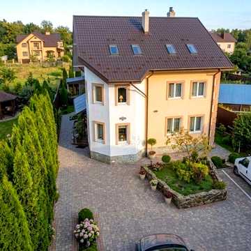 Власник. Будинок біля озера.288м² + гостьовий 95м² з сауною та чаном Гостомель. Ділянка 11 соток. Повна комплектація
