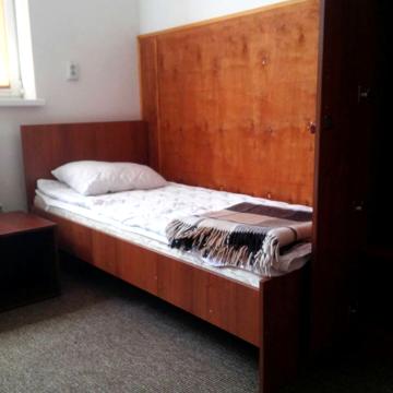 Кровать в четырехместном номере хостела