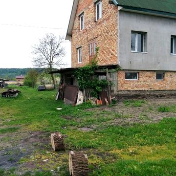 Продається  земельна ділянка з будинком