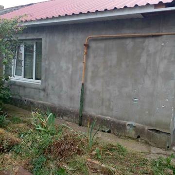 Продам дом в центре Беляевки .