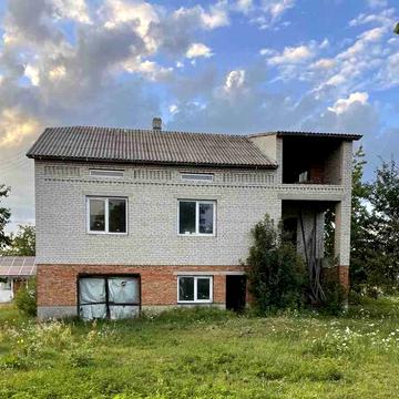 Будинок + земельна ділянка