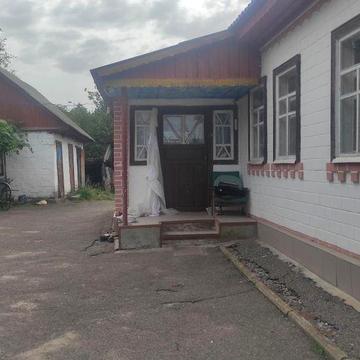 Дім з прибудовою