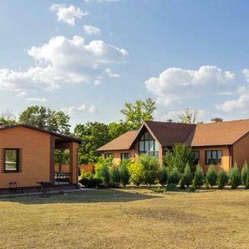 Продам современный одноэтажный дом с бассейном в поселке Элитное