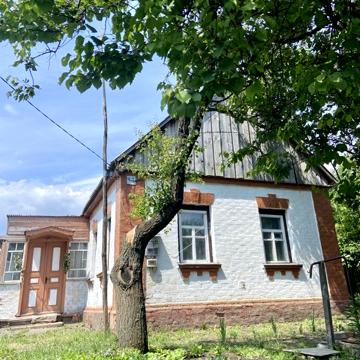 Продам будинок з земельною ділянкою смт.Парафіївка Чернігівська обл.