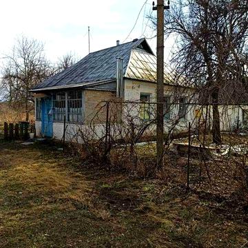 Жилий будиночок з подвірям