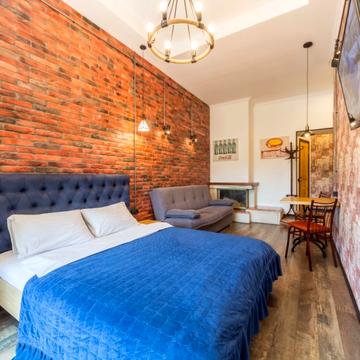 Дизайнерские апартаменты с балконом в стиле лофт