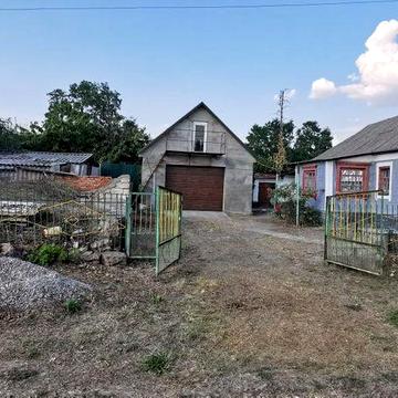 Продам житловий будинок з земельною ділянкою в с. Мигія
