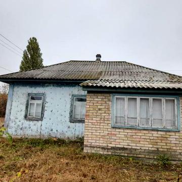 Продається житловий будинок із земельною ділянкою