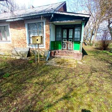 Будинок в селі Куражин