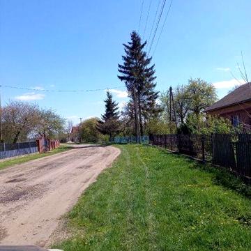 Продаж 2-х пов.частини цегл  будинку та 49 сот землі у с.Трудолюбівка