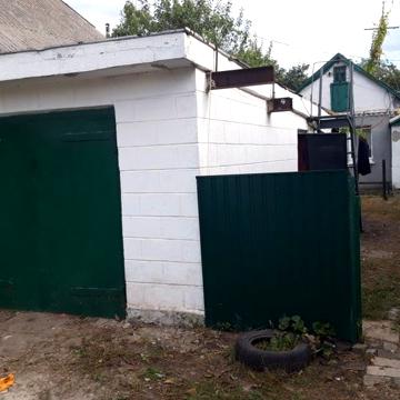 Продам дом, гараж, летняя кухня под  Ремонт.