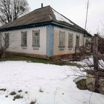 Добротний цегляний будинок