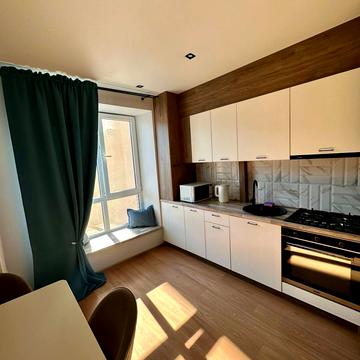 Набережна Перемоги вул., 1-Т