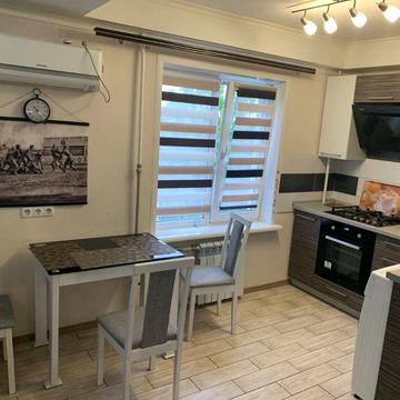 Олімпійська вул., 20