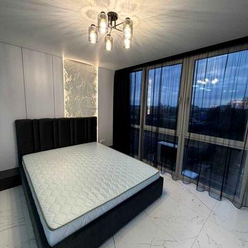 Олега Мудрака вул. (Генерала Наумова), 1-Б