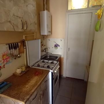 Євгена Коновальця вул. (), 25