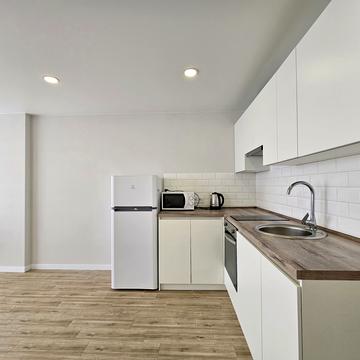 Олега Мудрака вул. (Генерала Наумова), 1-Б