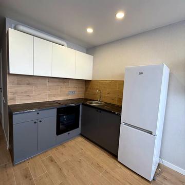 Олега Мудрака вул. (Генерала Наумова), 1-Б