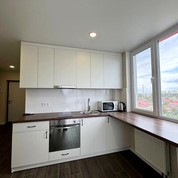 Олега Мудрака вул. (Генерала Наумова), 1-Б