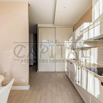 Євгена Коновальця вул. (Щорса), 34-А