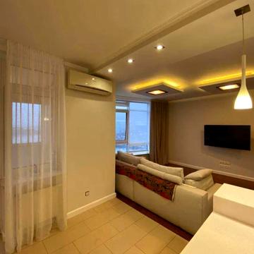 Миколи Ушакова вул., 1-В