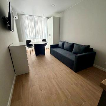 Олега Мудрака вул. (Генерала Наумова), 1-Б