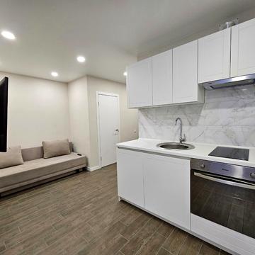 Олега Мудрака вул. (Генерала Наумова), 1-Б