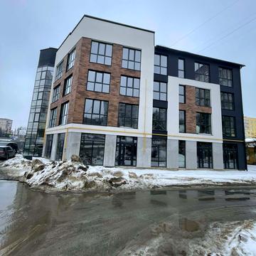 Коновальця вул., (Будинок)