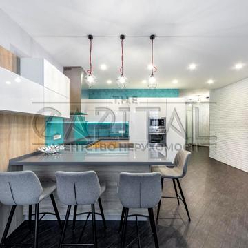 Євгена Коновальця вул. (Щорса), 44-А