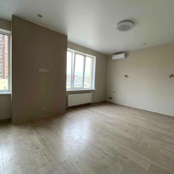 Євгена Коновальця вул. (Щорса), 36-Е