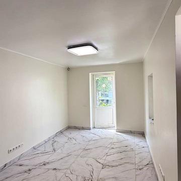 Яворницького вул., 27-29