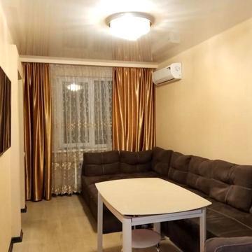 Олімпійська вул., 13