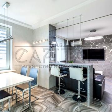 Дмитрівська вул., 75