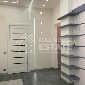 Євгена Коновальця вул. (Щорса), 44-А