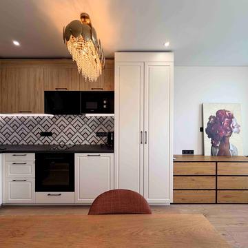 Олега Мудрака вул. (Генерала Наумова), 1-Б