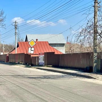 Першотравнева вул., 26