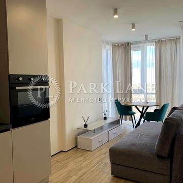 Олега Мудрака вул. (Генерала Наумова), 1-Б