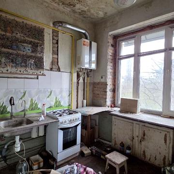 Степана Тільги вул. (Революційна), 10