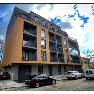 Братів Міхновських вул. (Московська), 14